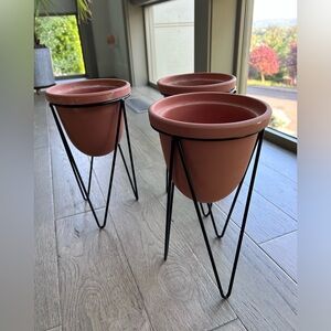 Terracotta Planters with Black Metal Stands Set of three planters